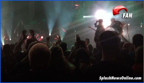 Motley Crue Guitarist Mick Mars Knocked Over Onstage by Crazed Fan